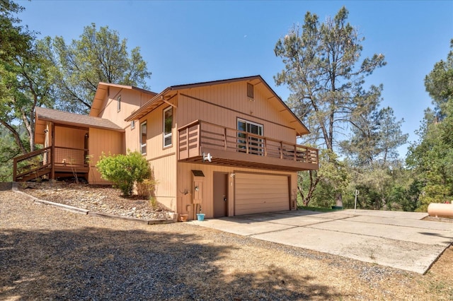 view of side of property with a garage