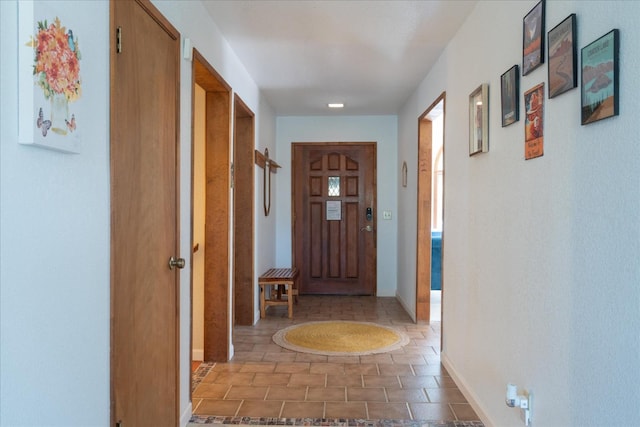 foyer entrance featuring tile flooring