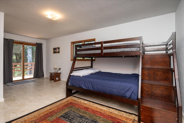 tiled bedroom with a barn door