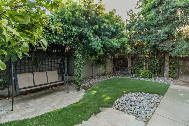 view of yard with fence