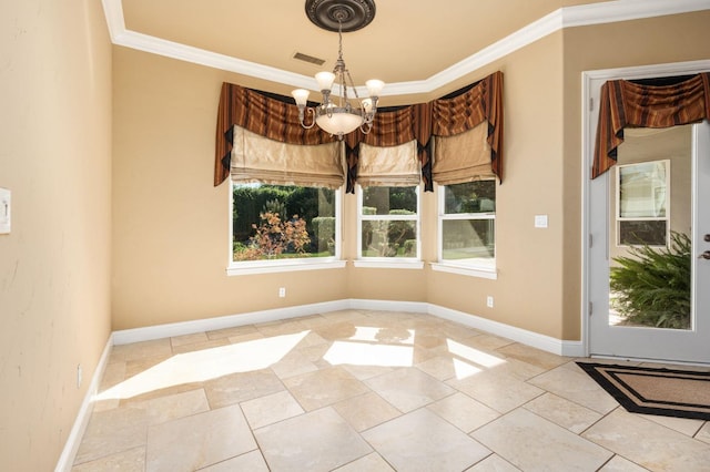 unfurnished dining area featuring a chandelier, ornamental molding, visible vents, and baseboards