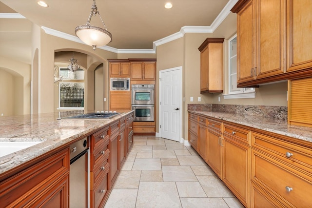 kitchen with brown cabinetry, ornamental molding, light stone countertops, stainless steel appliances, and recessed lighting