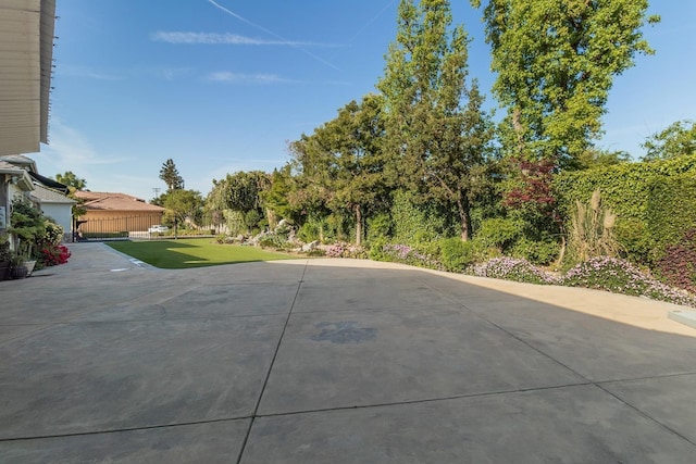 view of patio / terrace featuring fence