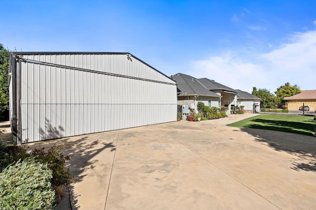 view of side of property featuring a yard