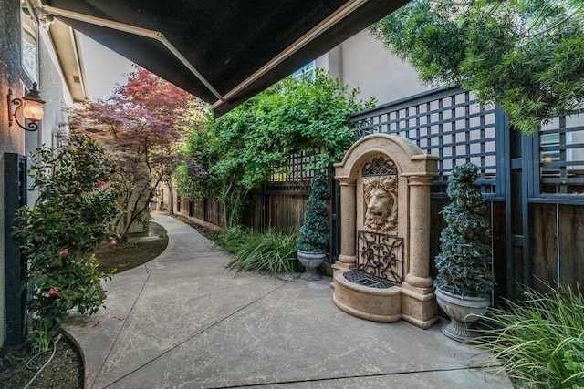 view of patio / terrace featuring fence