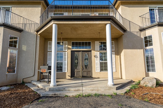 doorway to property with a balcony