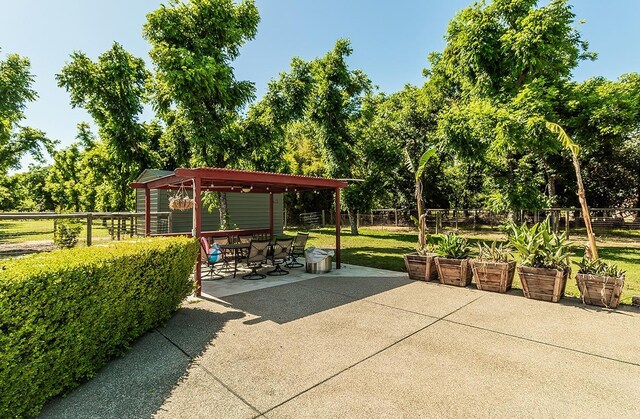 view of community with a patio