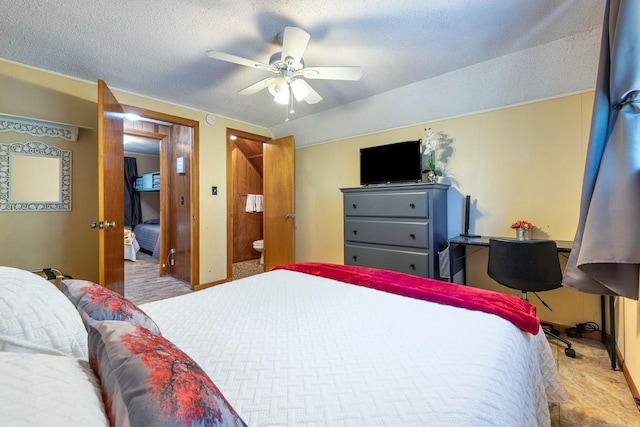 bedroom featuring ceiling fan and a textured ceiling