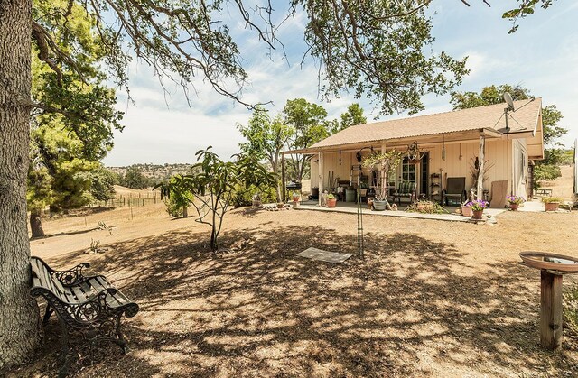 rear view of house with a patio area