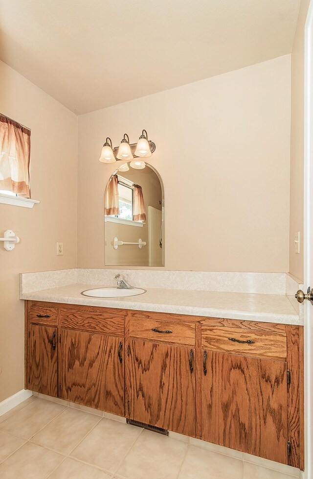 bathroom with vanity and tile patterned floors