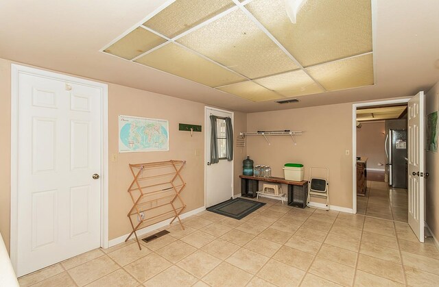 view of tiled foyer entrance