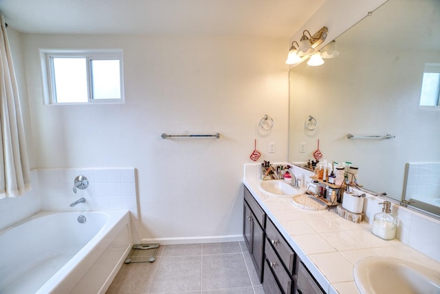 bathroom featuring dual vanity, tile floors, and a bath