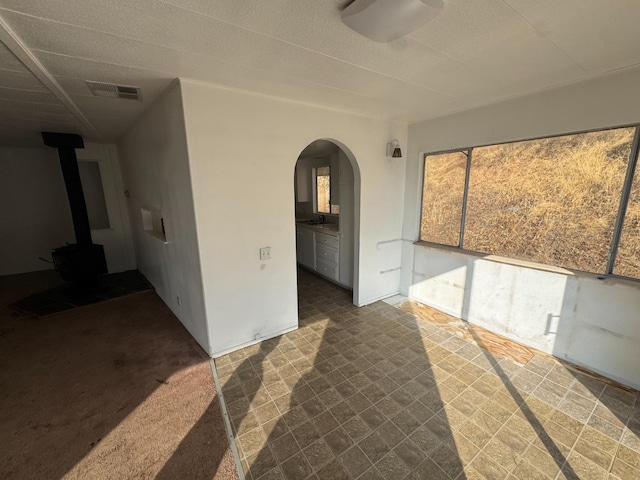 interior space with a wood stove