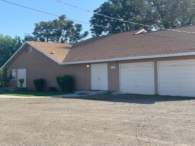 single story home featuring a garage