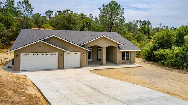 single story home with a garage