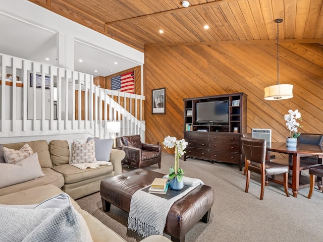 carpeted living area featuring recessed lighting, wooden walls, wood ceiling, and stairs