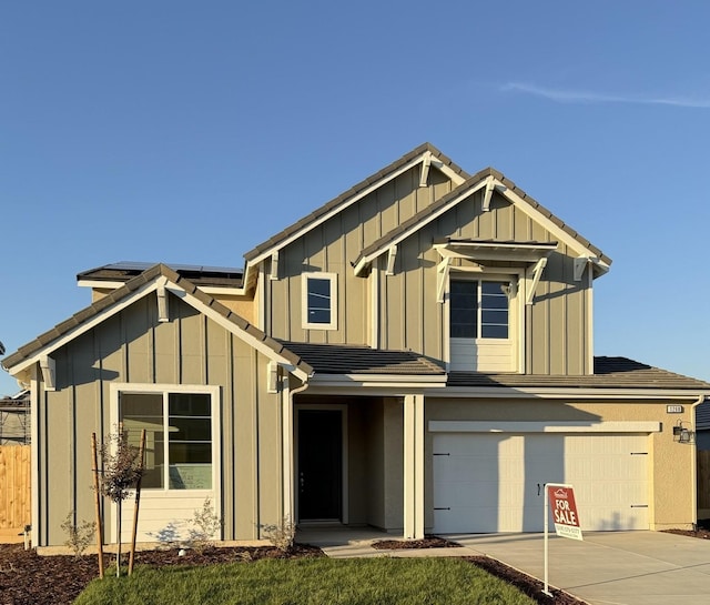 view of front of property featuring a garage