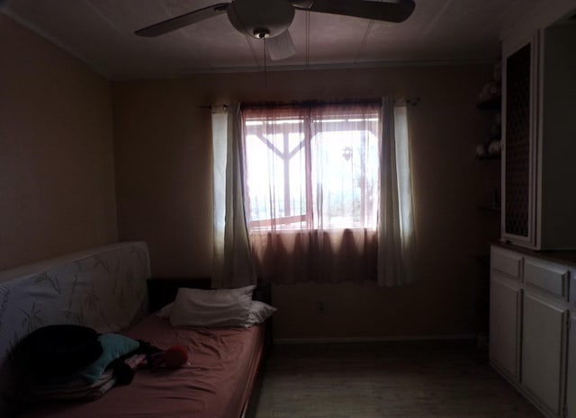 36839 Hopewell Rd, Yokuts Valley, CA 93675 - bedroom featuring light wood-type flooring, a ceiling fan, and baseboards