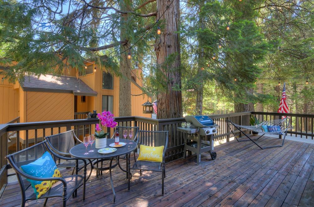 wooden terrace with grilling area