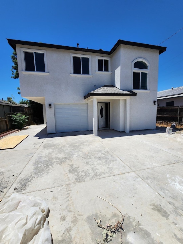 view of property featuring a garage