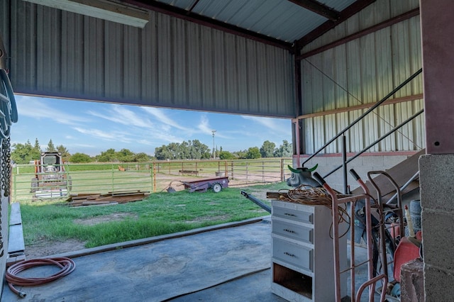 view of stable featuring a rural view