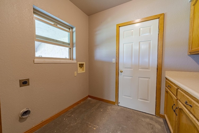 clothes washing area featuring washer hookup, cabinets, and hookup for an electric dryer