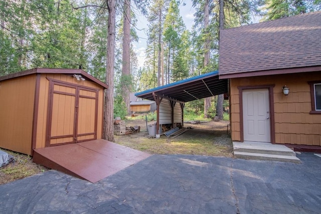 exterior space with a carport