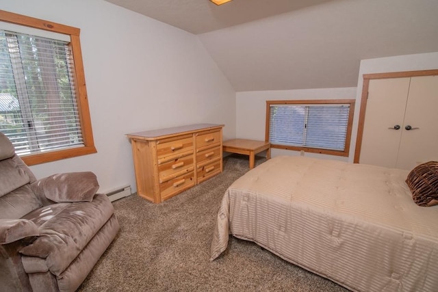 carpeted bedroom with lofted ceiling and a baseboard heating unit