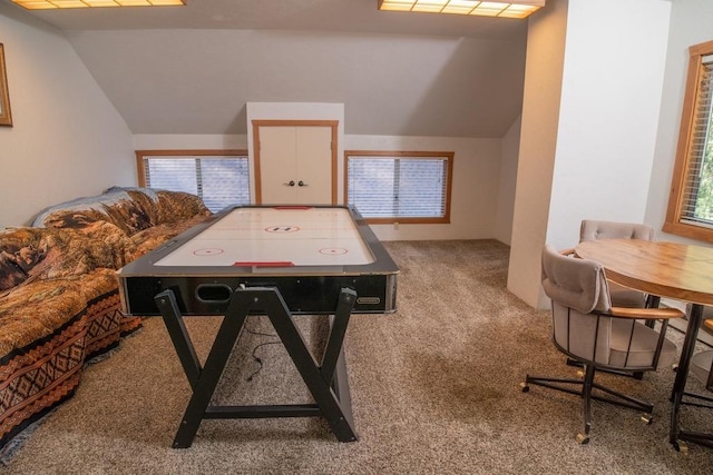 game room featuring vaulted ceiling and carpet flooring