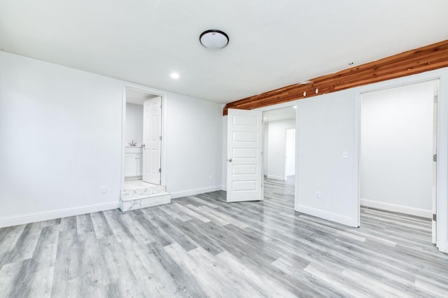 12647 E Clarkson Ave, Kingsburg, CA 93631 - interior space with ensuite bathroom, sink, light wood-type flooring, and a closet