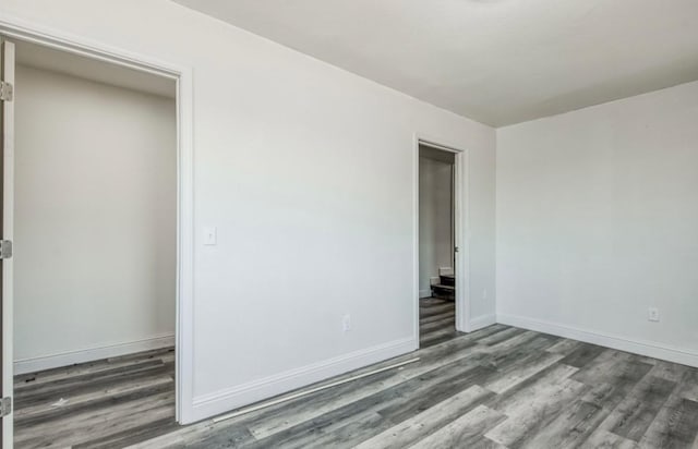 12647 E Clarkson Ave, Kingsburg, CA 93631 - unfurnished bedroom with hardwood / wood-style floors