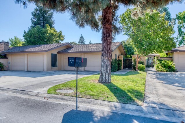 single story home with a garage