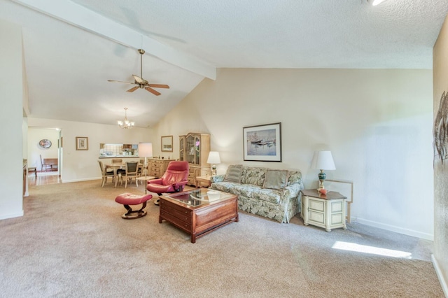 carpeted living room with beam ceiling, ceiling fan with notable chandelier, and high vaulted ceiling