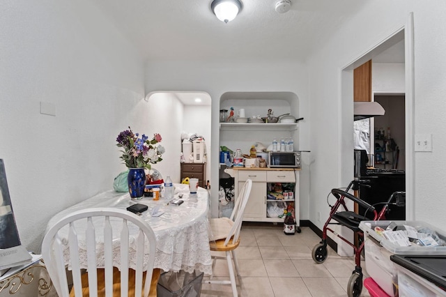 628 N Fresno St, Fresno, CA 93701 - dining space with light tile patterned floors