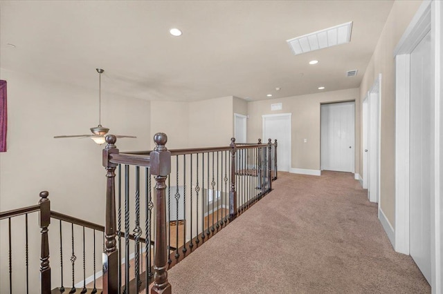 corridor featuring carpet floors