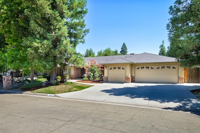 single story home featuring a garage