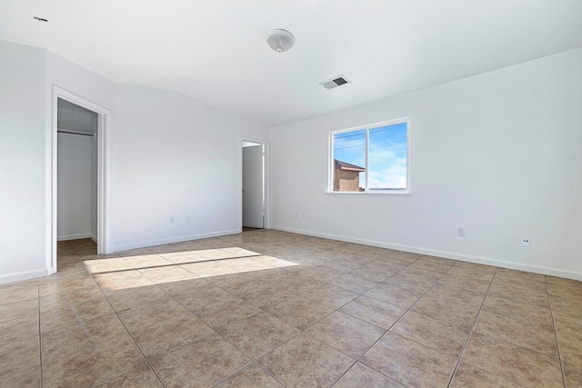 unfurnished bedroom featuring light tile patterned flooring