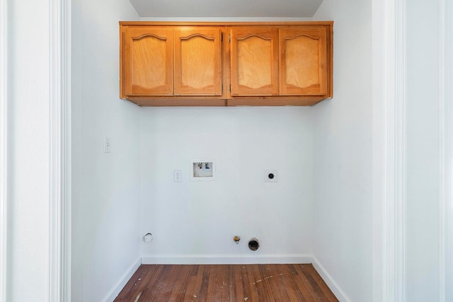 clothes washing area with cabinets, washer hookup, gas dryer hookup, dark wood-type flooring, and electric dryer hookup