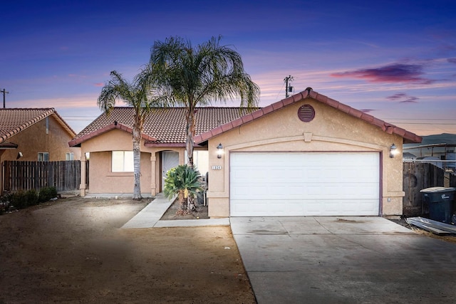 view of front of house with a garage