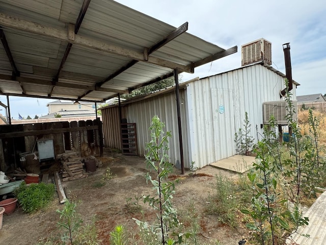 exterior space featuring a carport