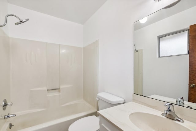 full bathroom featuring shower / bathtub combination, vanity, and toilet