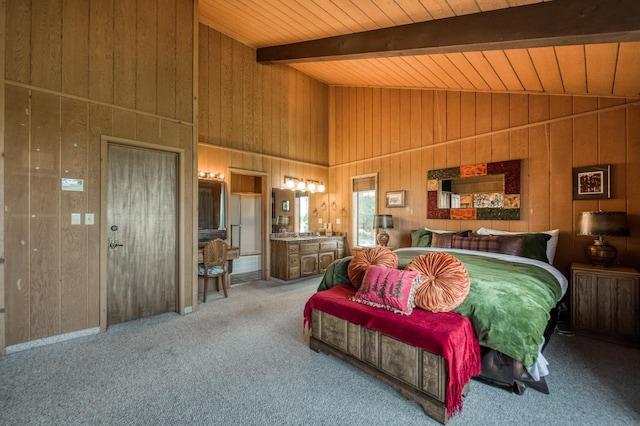 bedroom featuring beamed ceiling, carpet, and high vaulted ceiling