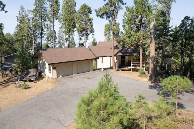 ranch-style home featuring a garage