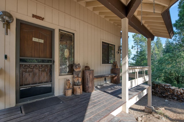 doorway to property with a deck