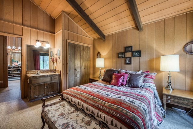 carpeted bedroom featuring wood walls, sink, lofted ceiling with beams, and wooden ceiling