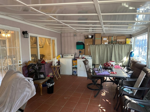 sunroom featuring washer and dryer