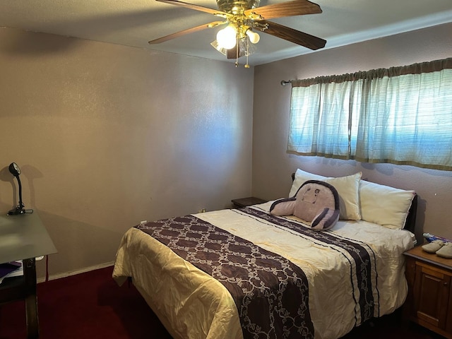 bedroom featuring ceiling fan