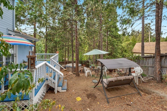 view of yard with a wooden deck