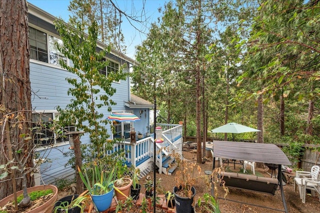 exterior space featuring a wooden deck