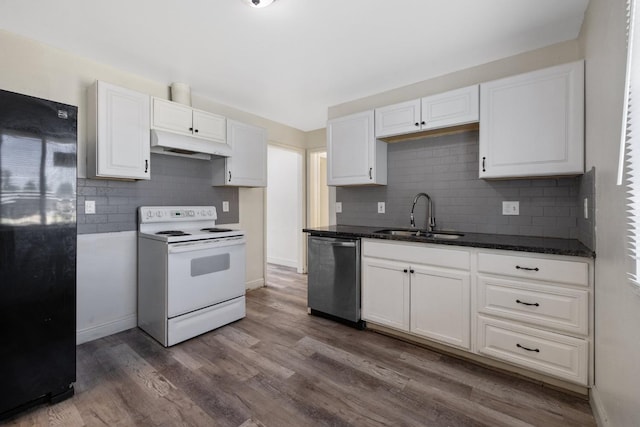 kitchen featuring stainless steel dishwasher, electric stove, black fridge, sink, and dark hardwood / wood-style floors